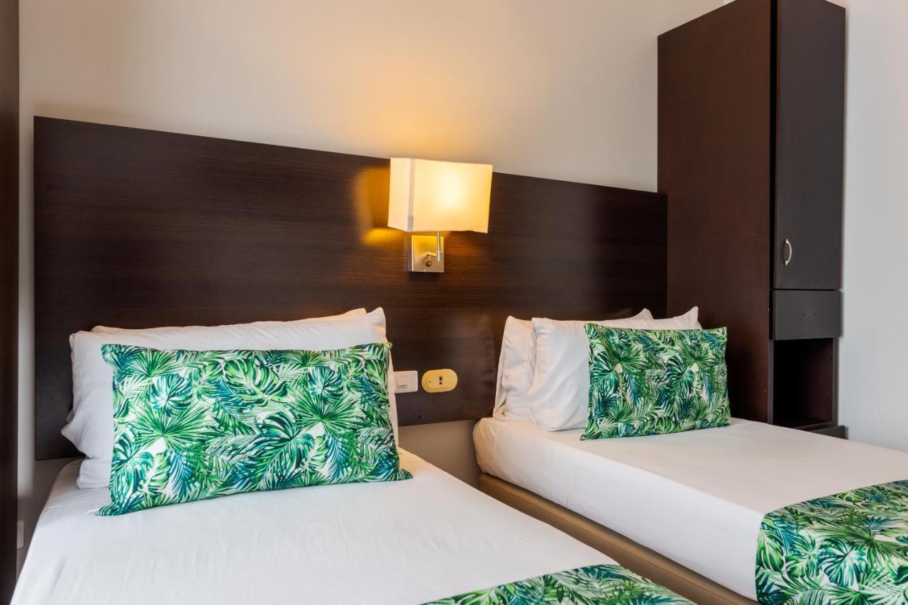 Hotel Manantial เมลการ์ ภายนอก รูปภาพ