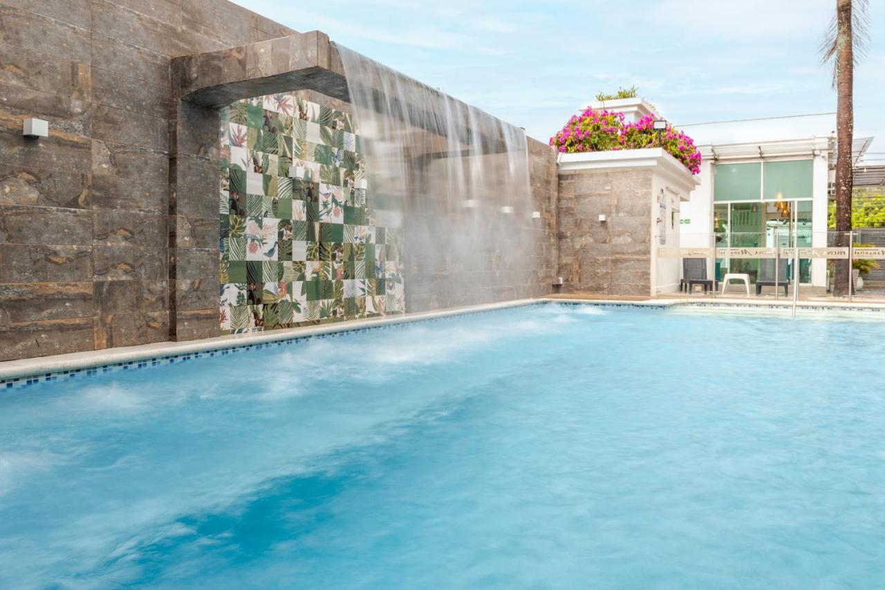 Hotel Manantial เมลการ์ ภายนอก รูปภาพ