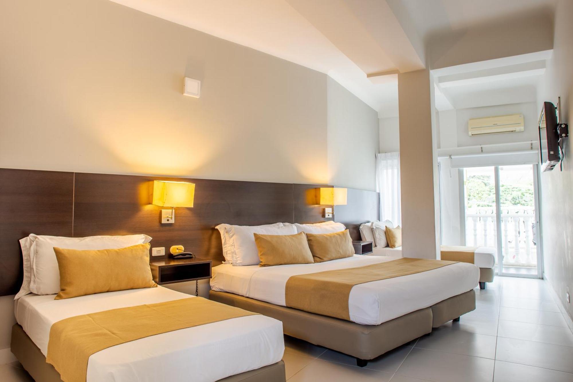 Hotel Manantial เมลการ์ ภายนอก รูปภาพ