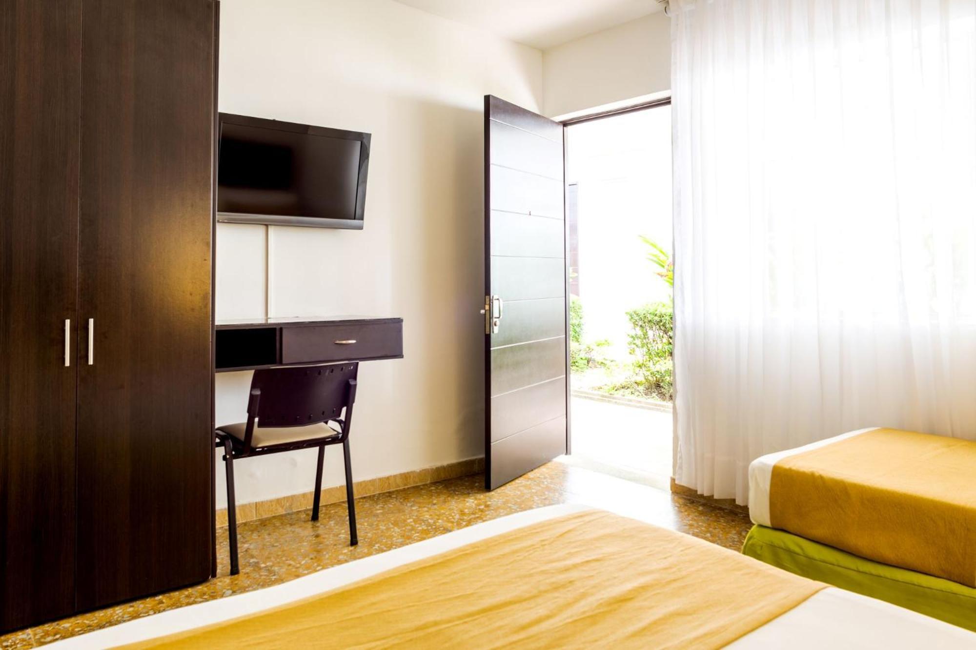 Hotel Manantial เมลการ์ ภายนอก รูปภาพ